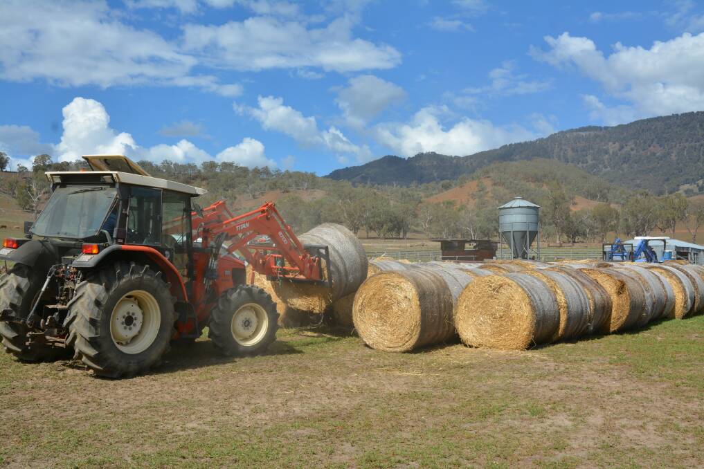 ASSISTANCE: Offloading of donated hay at 1260 acre cattle property “Bullarer” at Stewarts Brook in the Upper Hunter.