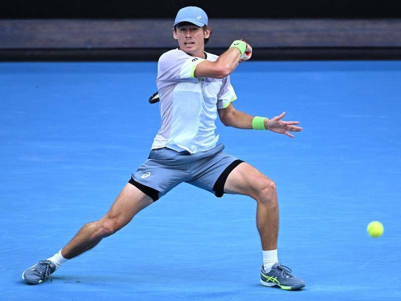 Local hope Alex de Minaur has kick-started his Australian Open with a straight-sets victory. Picture by James Ross/AAP Photos.