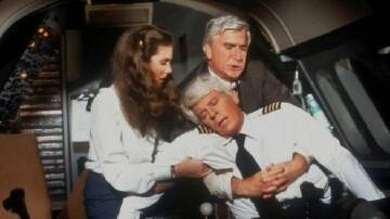 Flying High - Captain (Peter Graves), Elaine Dickinson (Julie Hagerty), Dr Rumack (Leslie Nielsen).