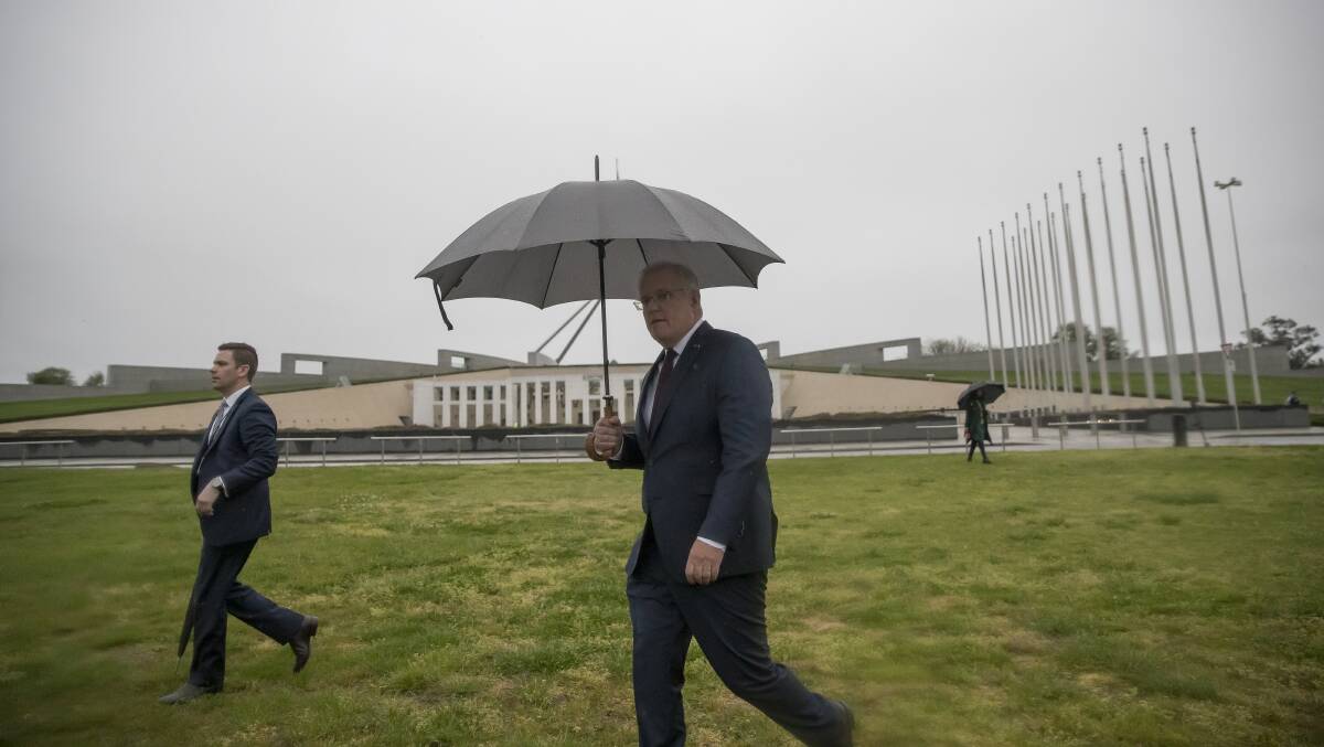 Prime Minister Scott Morrison says he won't commit to a net-zero position without being able to tell Australians how much it will cost. Picture: Sitthixay Ditthavong