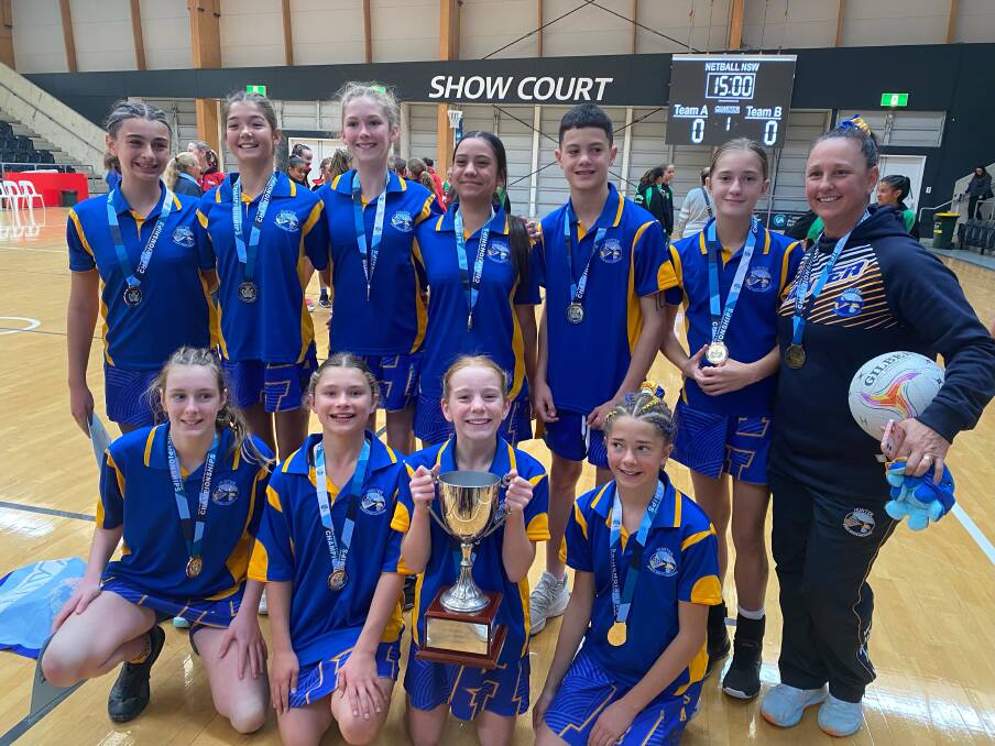 The victorious Hunter PSSA netball team with coach Louise Cooper. Picture: Supplied