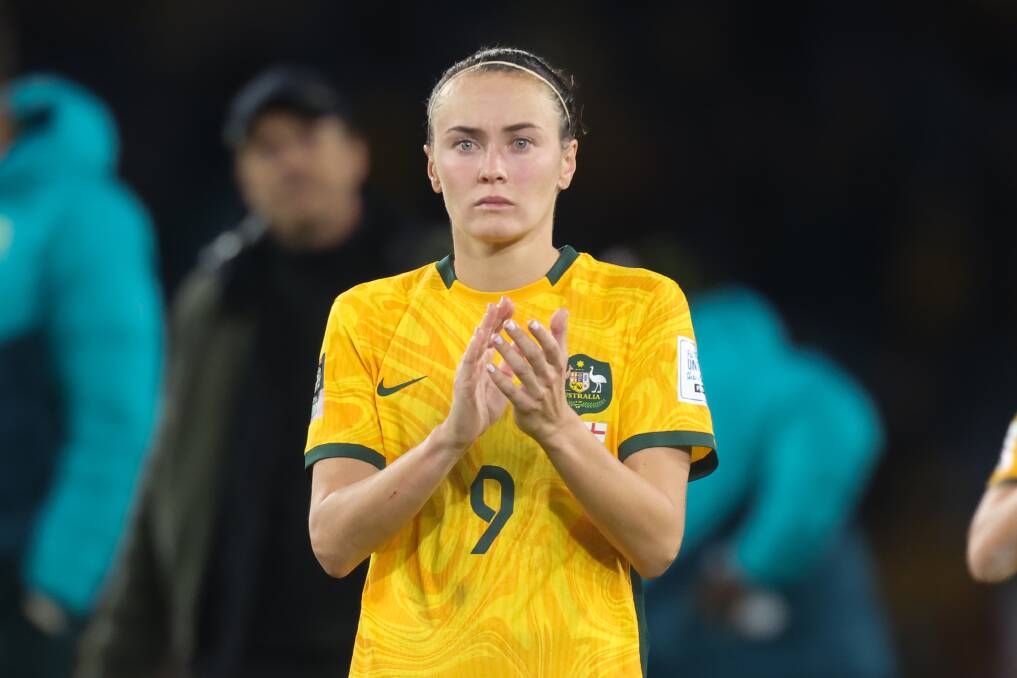 Caitlin Foord thanks the fans after Australia's devastating 3-1 loss to England at Stadium Australia on Wednesday night. Picture by Adam McLean