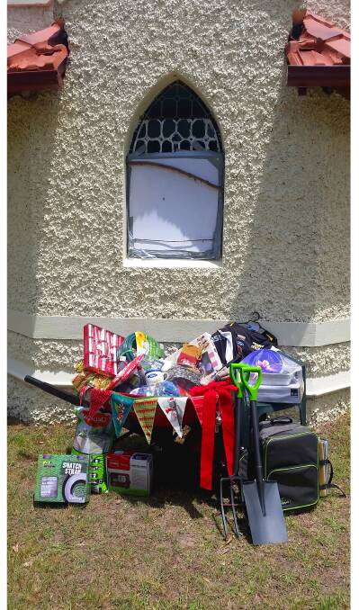 SUPPORT: The Reedy Creek Christmas raffle will raise funds to pay for the replacement of the church's centrepiece window, which was damaged in late October. The Reedy Creek Christmas service will begin at 5pm on Sunday.