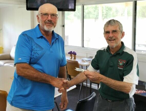 Alan Flanagan is congratulated by Vets vice captain Graham Turvey on winning the Vets' Stableford event at Murrurindi Golf Club on Tuesday, January 31, with 36 points. Picture supplied.