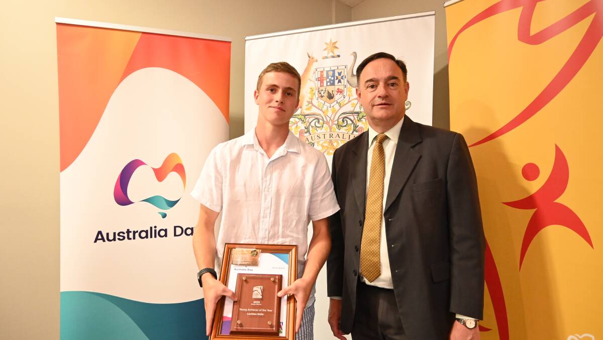 Lachlan Hails was named Scone Young Achiever of the Year at the Upper Hunter Shire Council's Australia Day awards for 2023. Picture with general manager Greg McDonald. Picture by Jess Wallace. 