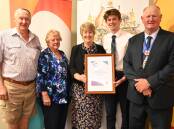 Scone's Hamish Guiana has been named Upper Hunter Shire Young Citizen of the Year for 2023. He is picture with award sponsors Errol and Beryl Bates (on left), Cr Lee Watts (middle) and mayor Maurice Collision. Photo by Jess Wallace.
