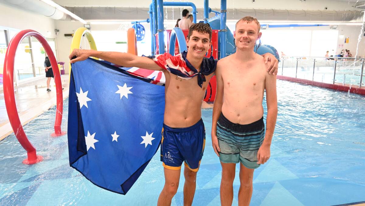 Jacob Horton (left) and Luke McDonald escape the Australia Day heat at Muswellbrook Aquatic Centre on January 26, 2023. Picture by Jess Wallace.