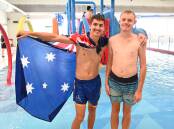 Jacob Horton (left) and Luke McDonald escape the Australia Day heat at Muswellbrook Aquatic Centre on January 26, 2023. Picture by Jess Wallace.