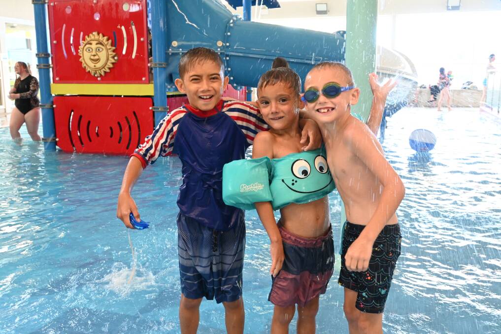 (From left) Christopher Gardiner with Reggie and Charlie Etienne at Muswellbrook Aquatic Centre. Picture by Jess Wallace.