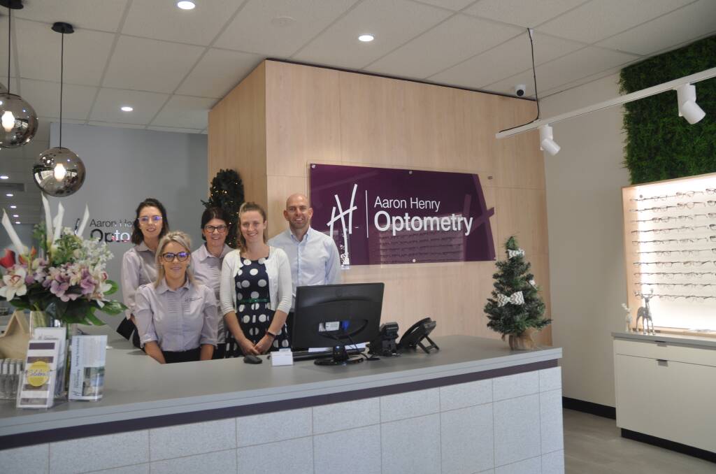 TEAM: The team at the new premises of Aaron Henry Optometry are looking forward to providing the same great care to clients.