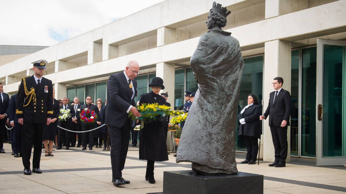 Governor-General David Hurley, and Mrs Hurley lay a wreath for Queen Elizabeth II. Picture by Elesa Kurtz