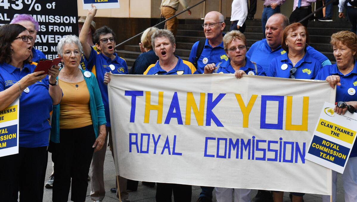 Thanks: Survivors of child sexual abuse in children's homes across Australia outside the royal commission hearing rooms in Sydney on Thursday for the final sitting. The group campaigned strongly for a royal commission.