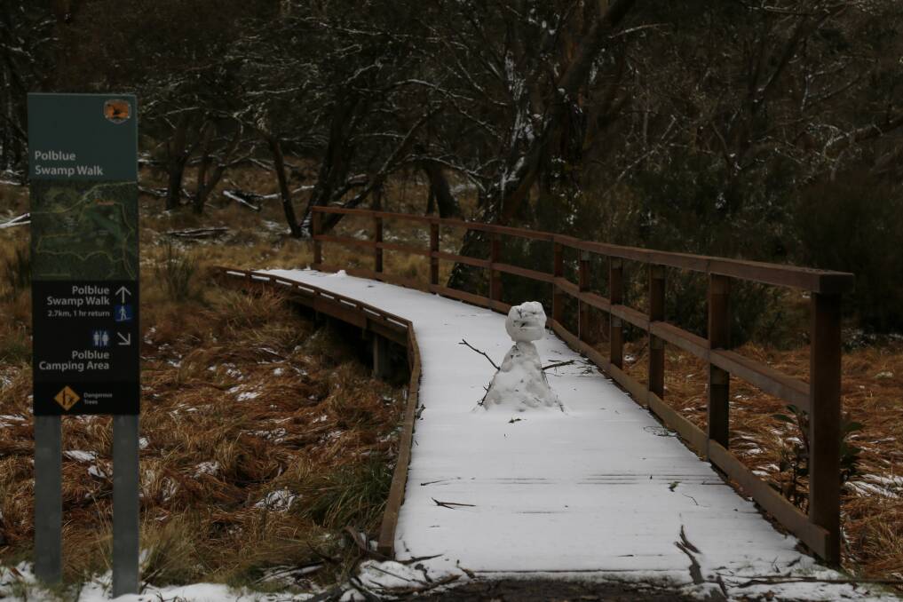 A snowman on the Polblue Swamp track bridge, a popular walk on the Barrington Tops Plateau. 