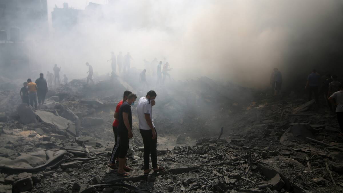 Palestinians look for survivors after an airstrike on the Gaza Strip. Picture Shutterstock