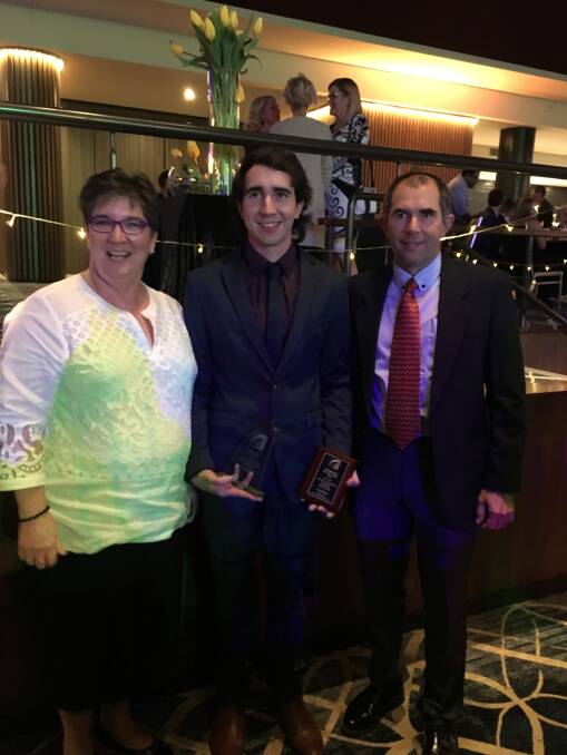 Winner are grinners: Apprentice of the Year, Liam Ryan, with his proud parents, Michael and Moya, at the recent HRATA Awards. Photo: Supplied.