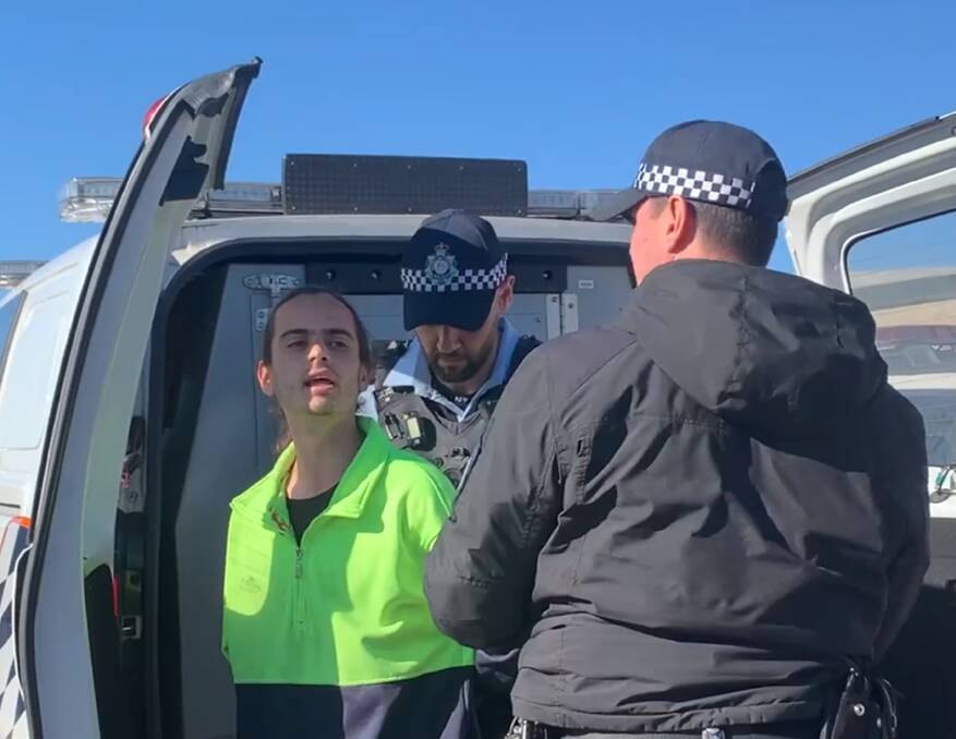 Police arresting an Extinction Rebellion member on Tuesday. Picture: Supplied