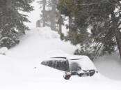 A big dump of snow and blizzard conditions had led to major road closures in California. (EPA PHOTO)