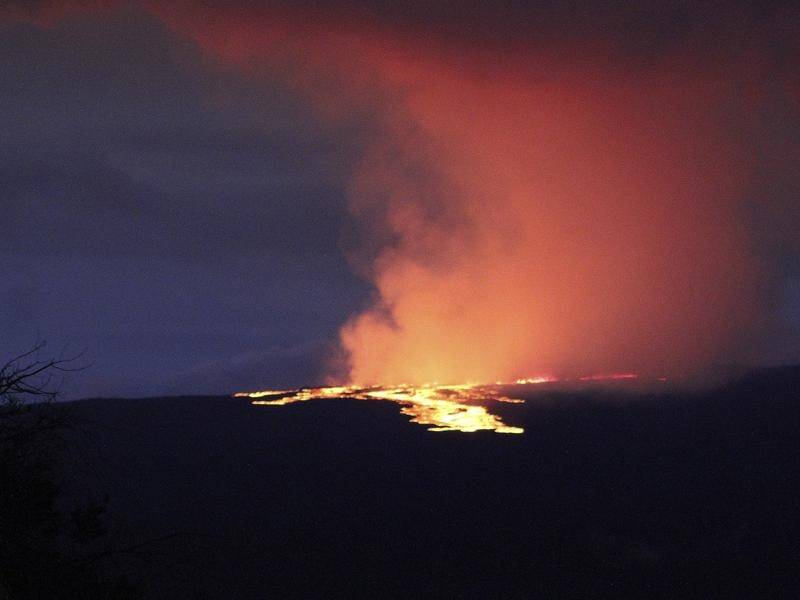 Lava pours out of the summit crater of Mauna Loa, Hawaii, for the first time in four decades. (AP PHOTO)