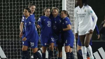 Sam Kerr (l) and her Chelsea teammates celebrate their equaliser against Real Madrid in the WCL. (EPA PHOTO)