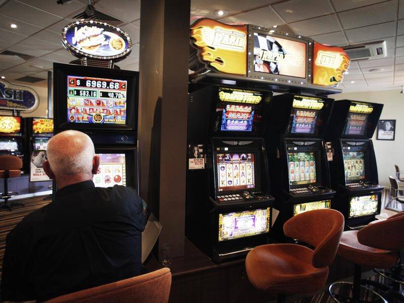 A report revealed a significant amount of money put into pokies each year is the proceeds of crime. (Paul Jeffers/AAP PHOTOS) A report revealed a significant amount of money put into pokies each year is the proceeds of crime. (Paul Jeffers/AAP PHOTOS)