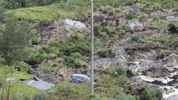 The E6 motorway in western Sweden collapsed after it was hit by a landslide. (AP PHOTO)