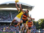Richmond will turn their focus to an AFL MCG blockbuster against Collingwood after beating Adelaide. (Matt Turner/AAP PHOTOS)
