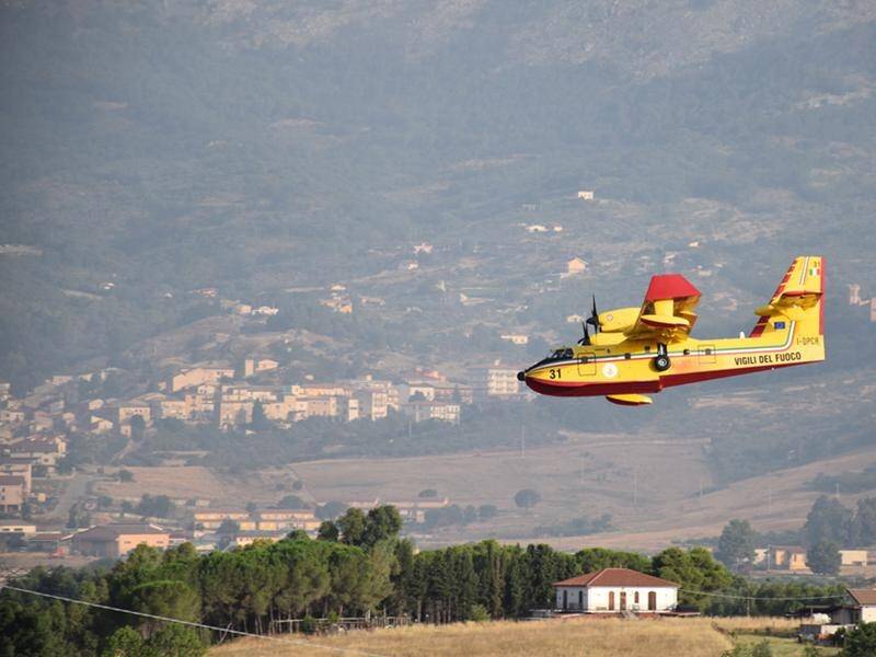 Emergency teams are battling wildfires that have devastated the Palermo area of Sicily in Italy.