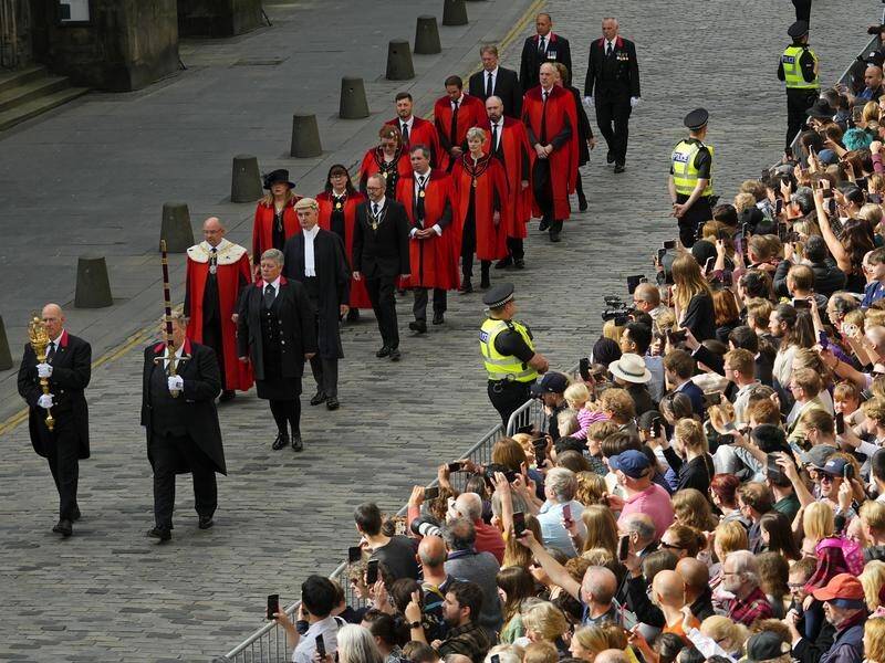 Hecklers were among people attending a proclamation for the accession of King Charles in Edinburgh. (AP PHOTO)