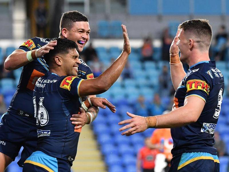The Gold Coast Titans have recovered from a slow start to edge the New Zealand Warriors in the NRL.