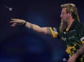 Australian Simon Whitlock (pic) was beaten 6-4 by Danny Noppert in the World Series of Darts Finals. (AP PHOTO)