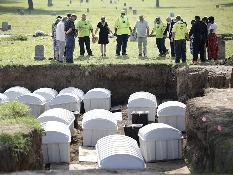 Bodies found in a mass grave in a search for victims of the Tulsa Race Massacre have been reburied.
