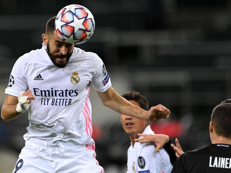 Karim Benzema (above) was left unimpressed by his Real teammate Vinicus Jnr, as TV viewers heard.