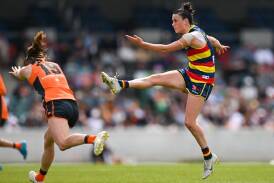 Teah Charlton kicks a goal for Adelaide in their big win over GWS on Saturday at Manuka Oval. (Lukas Coch/AAP PHOTOS)