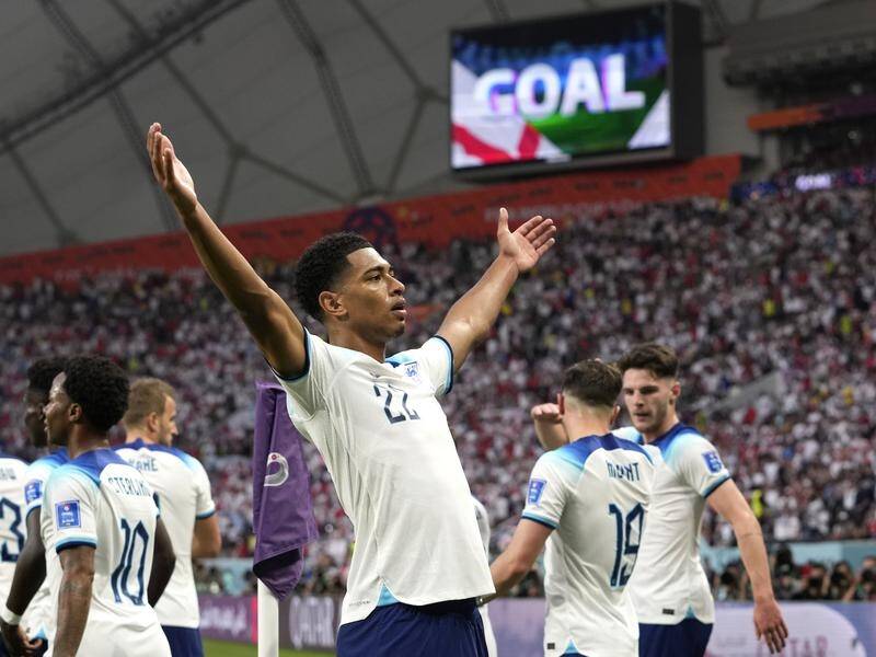 TeenagerJude Bellingham celebrates his opening goal in England's 6-2 World Cup win over Iran. (AP PHOTO)