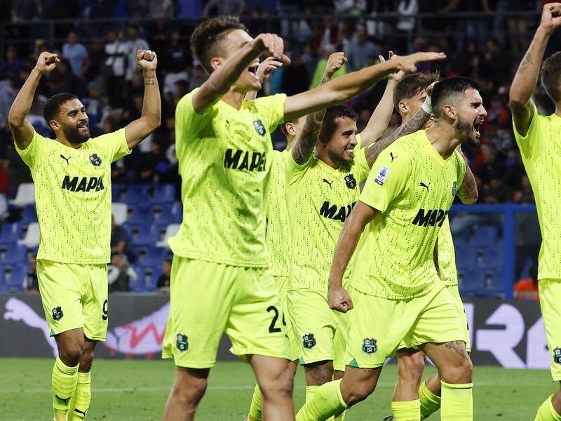 Sassuolo players celebrate another goal in their Serie A win over Juventus. (EPA PHOTO)