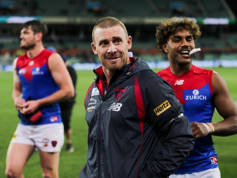 Coach Simon Goodwin has recovered from a bout of food poisoning and is back among the Demons.