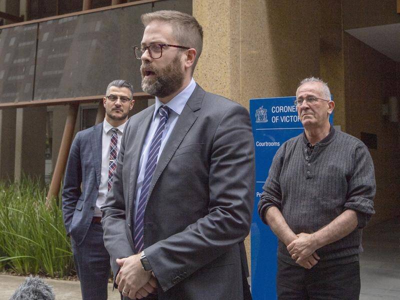 Lawyer Jeremy King (centre) says Victoria's mental health system failed the Messo family. (Will Murray/AAP PHOTOS)