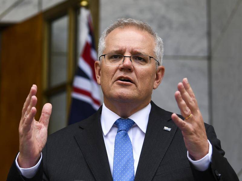 Scott Morrison say social media needs to take responsibility for online bullying and defamation.