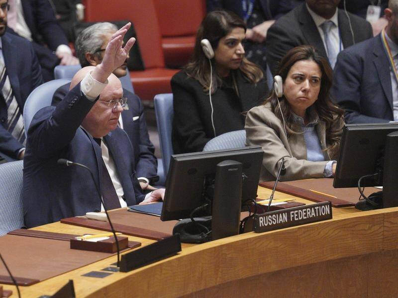 Russian ambassador Vassily Nebenzia raised his hand to give the only vote against the resolution. (AP PHOTO)