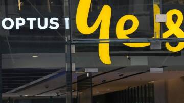 A Sydney man has been arrested for an alleged SMS scam linked to the Optus data breach. (AP PHOTO)