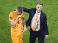 Two-goal sub Wout Weghorst is consoled by Louis van Gaal as the Netherlands exited the World Cup. (AP PHOTO)