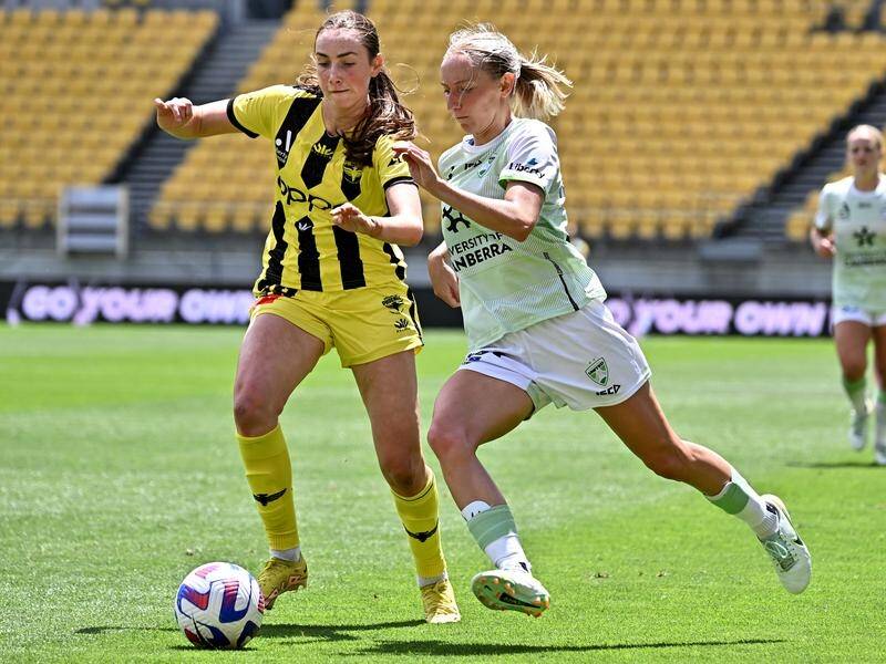 Wellington's Emily Clegg, left, scored two goals in her side's A-League Women win over Adelaide. (Masanori Udagawa/AAP PHOTOS)