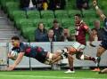 The Melbourne Rebels have run in six tries to beat the Queensland Reds 40-34 in Super Rugby Pacific. (James Ross/AAP PHOTOS)