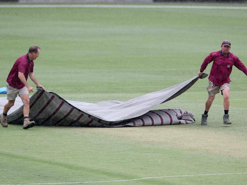 Rain has washed out the entire opening day of the Shield clash between Qld and WA at the Gabba. (Jono Searle/AAP PHOTOS)