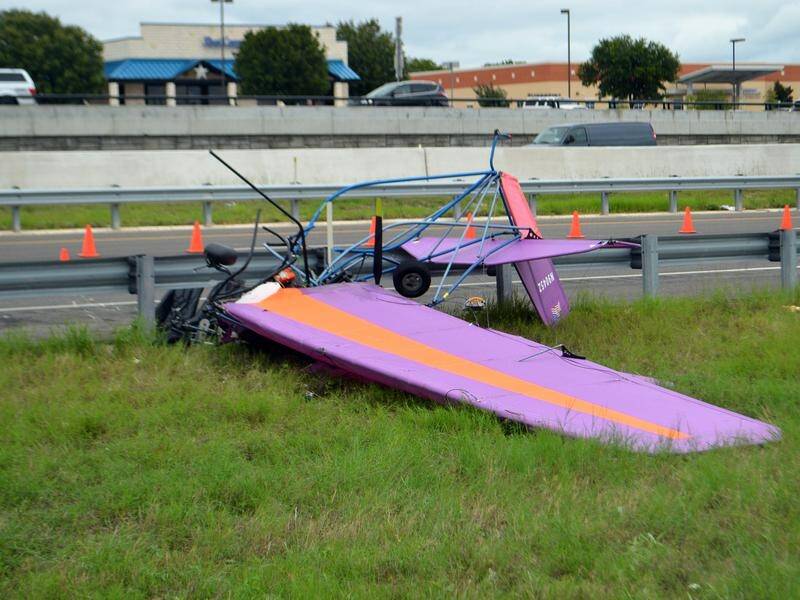Two people have been killed after an ultralight plane crashed onto a highway in Texas.