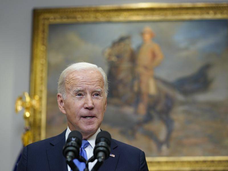 Vladimir Putin can't seize his neighbour's territory and get away with it, President Joe Biden said. (AP PHOTO)