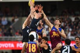 Brisbane overcame a slow start to get the better of Carlton and take their place in the grand final. (Jono Searle/AAP PHOTOS)