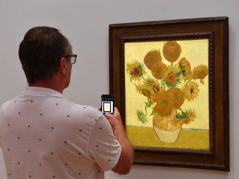 Climate protesters threw soup over Vincent van Gogh's "Sunflowers" at London's National Gallery. (Mick Tsikas/AAP PHOTOS)