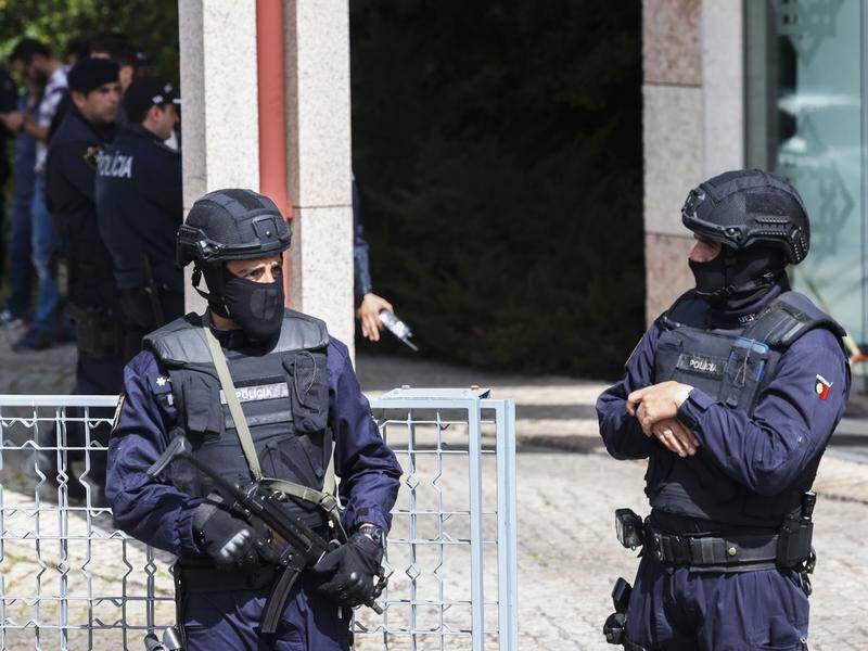 Police arrested an Afghan national after two people were killed at the Ismaili Centre in Lisbon. (EPA PHOTO)