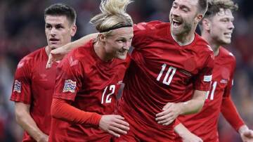 Denmark's Kasper Dolberg (second left) celebrates his goal in the 2-0 win over France. (AP PHOTO)